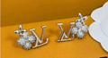 L Silver Logo Flower Earrings